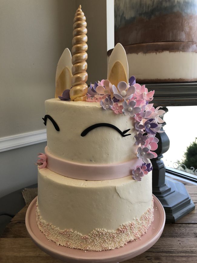 two-tiered unicorn cake